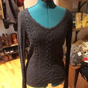 Crochet sweater with tie back